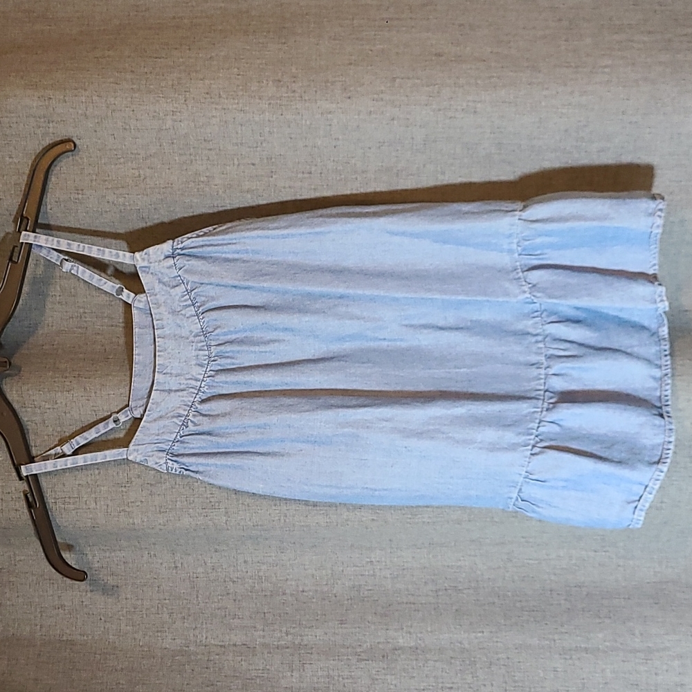 Chambray tank top with ruffle at the bottom